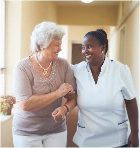 Caregiver keeping a senior woman company
